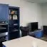 Open plan bespoke kitchen and lounge by Rao Furniture