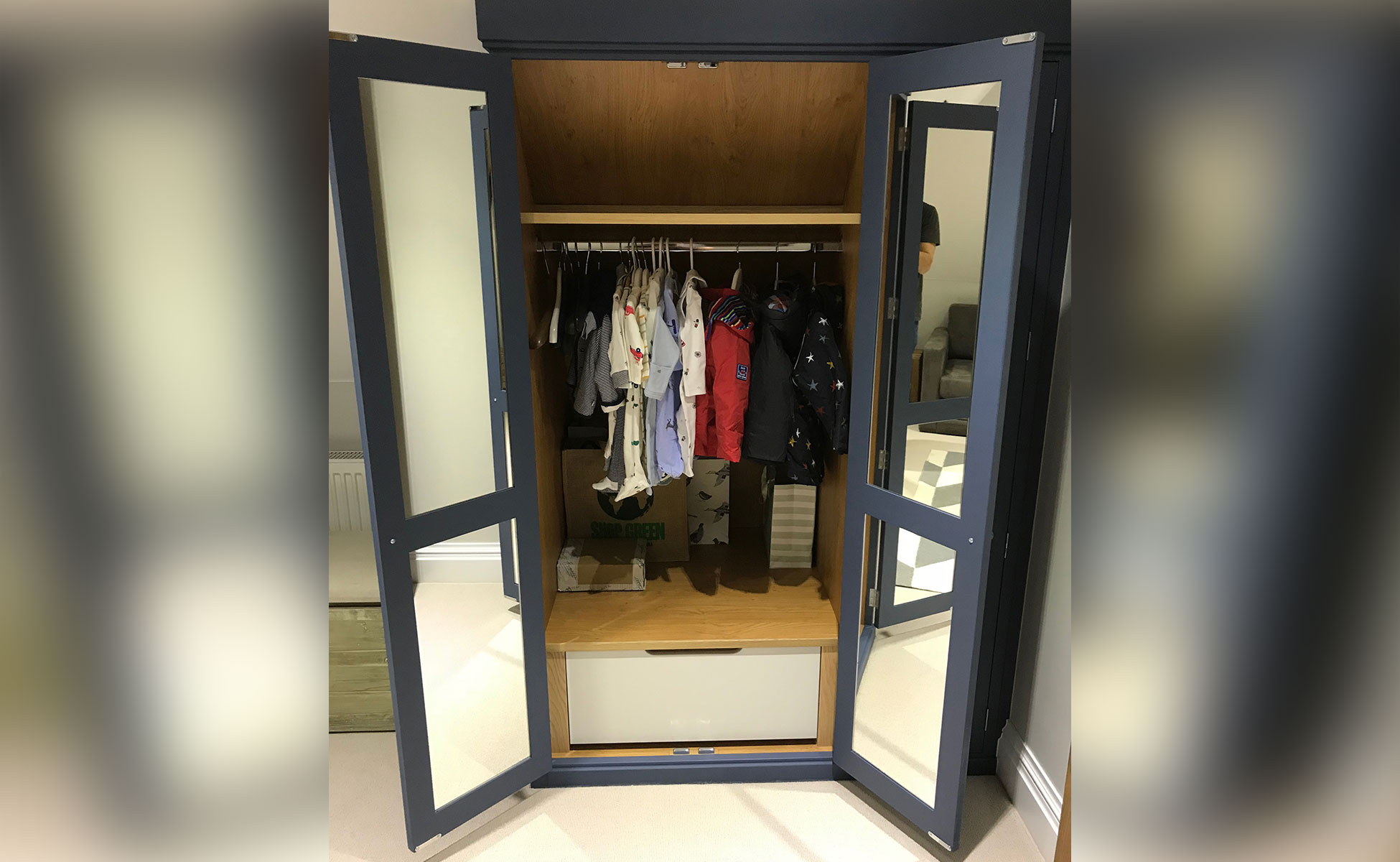 Bespoke angled wardrobes by Rao Furniture