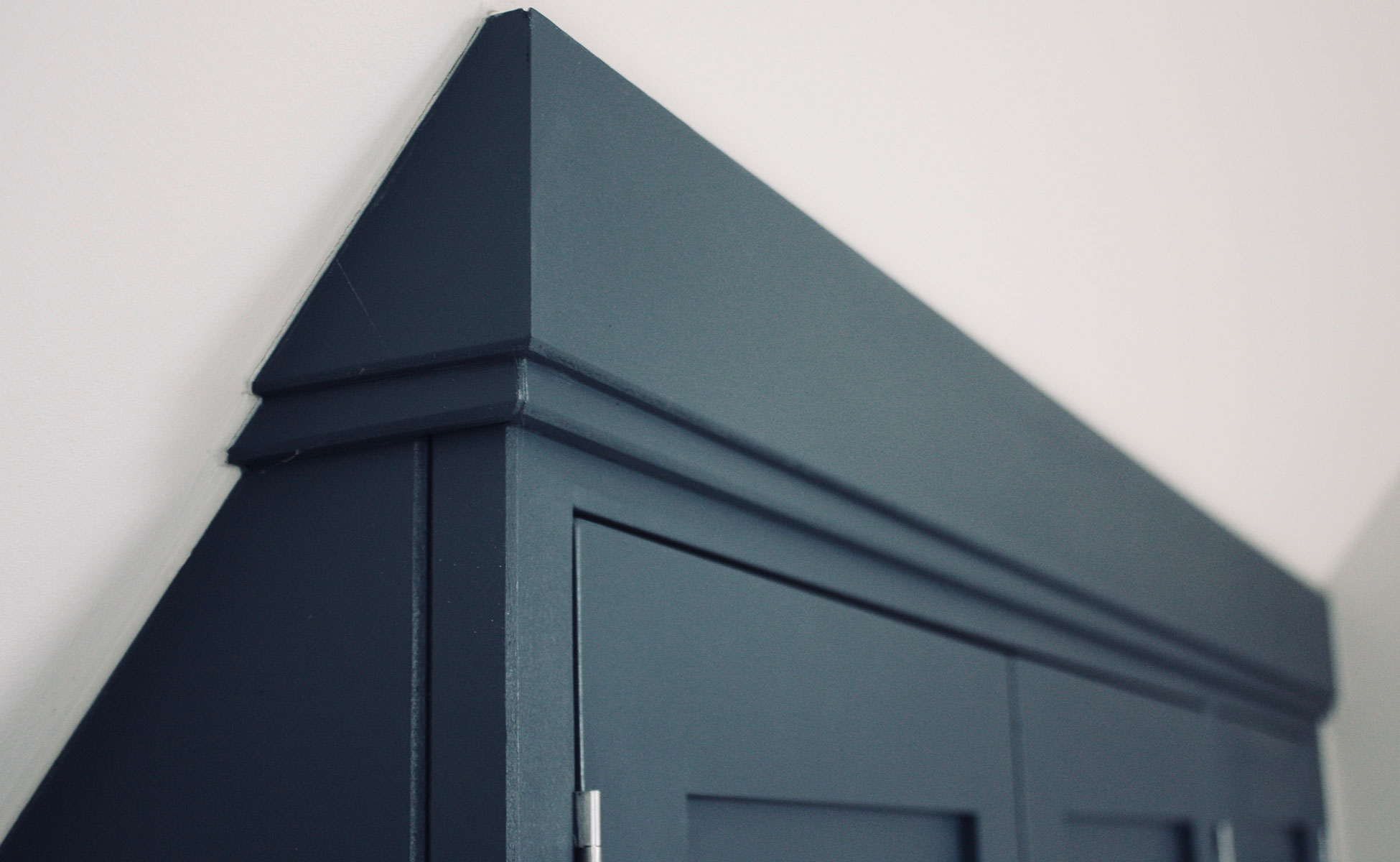 Bespoke angled wardrobes by Rao Furniture