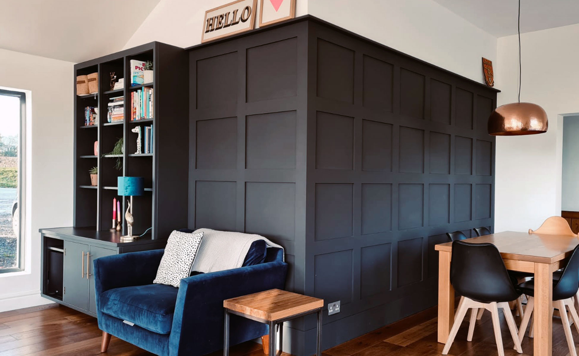 Family room bespoke bookcase and panelling by Rao Furniture