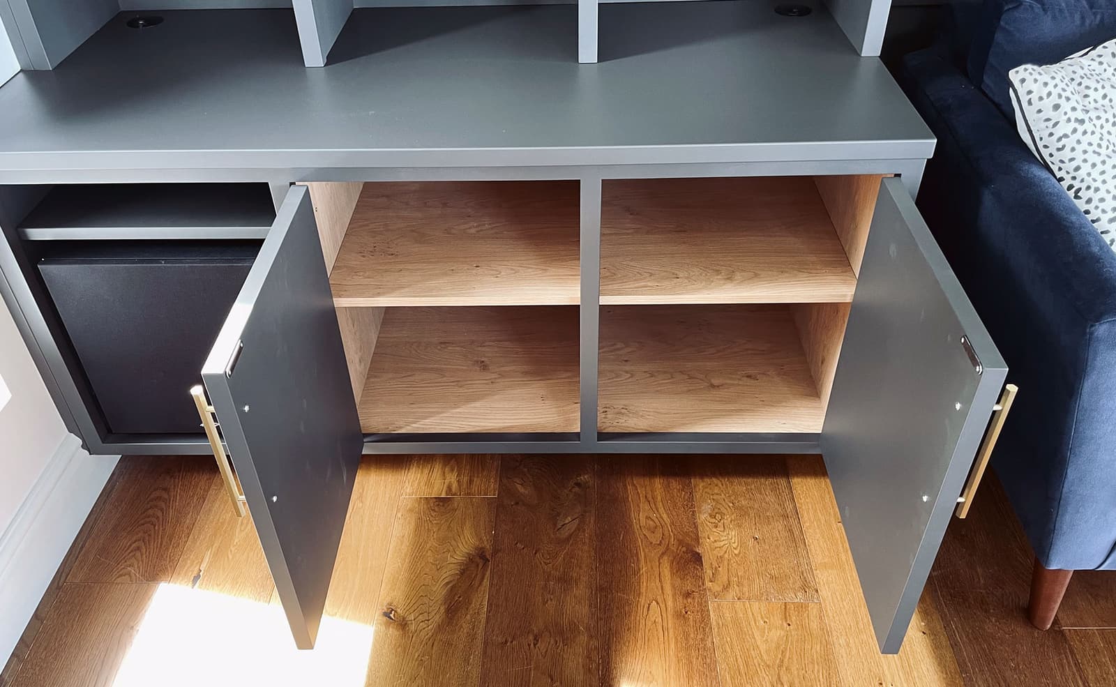 Family room bespoke bookcase and panelling by Rao Furniture