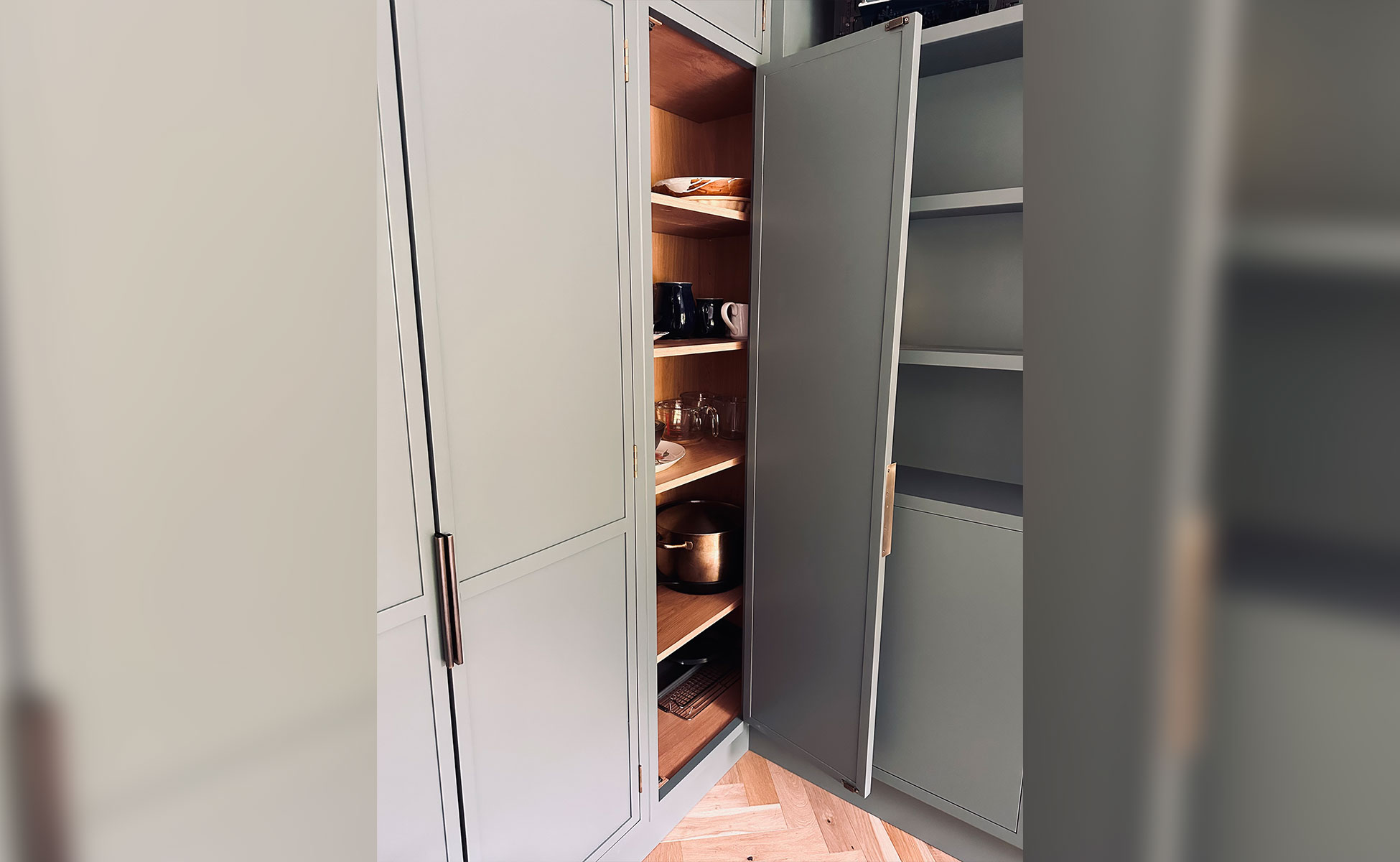 Open plan bespoke slim line kitchen by Rao Furniture