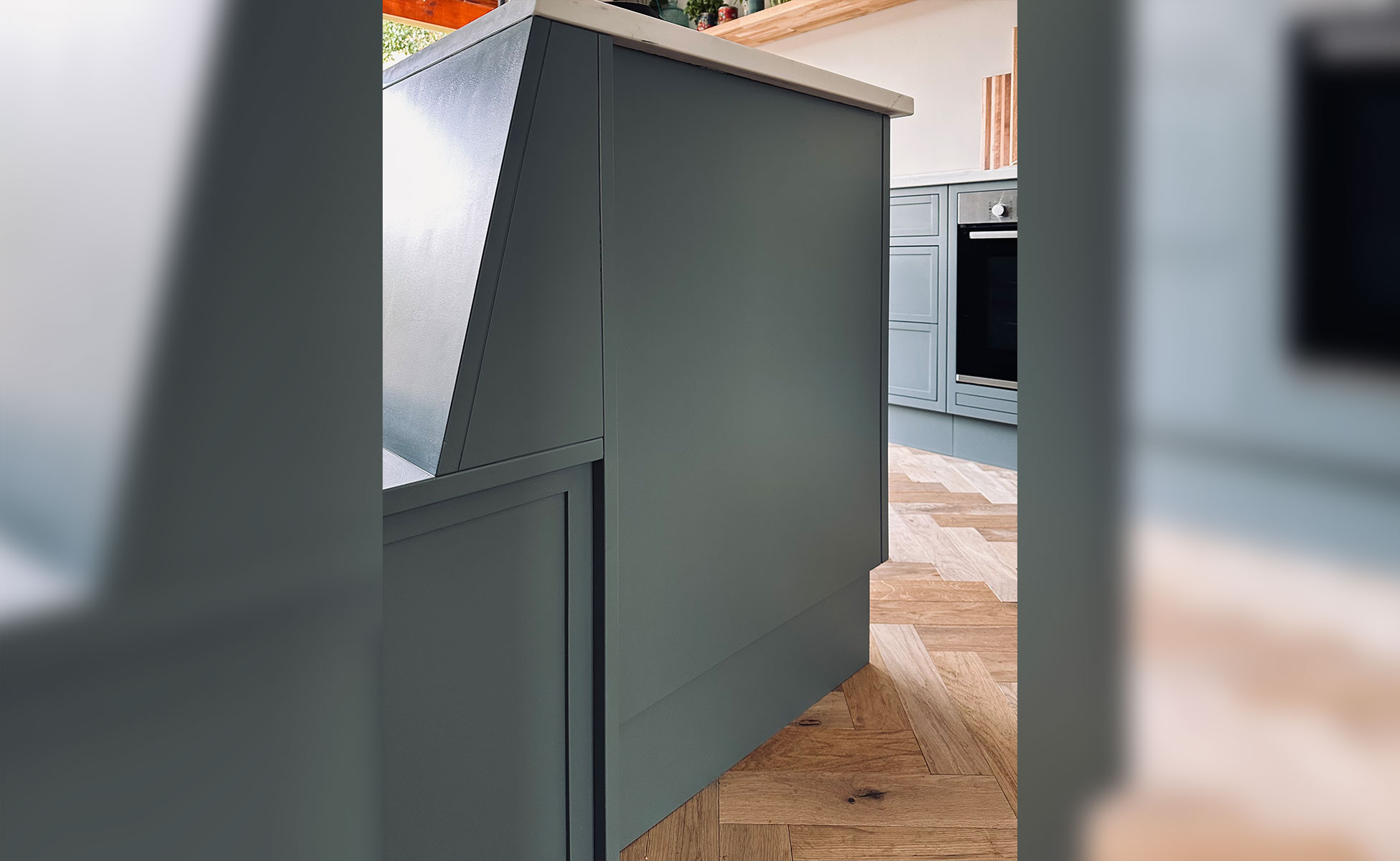 Open plan bespoke slim line kitchen by Rao Furniture